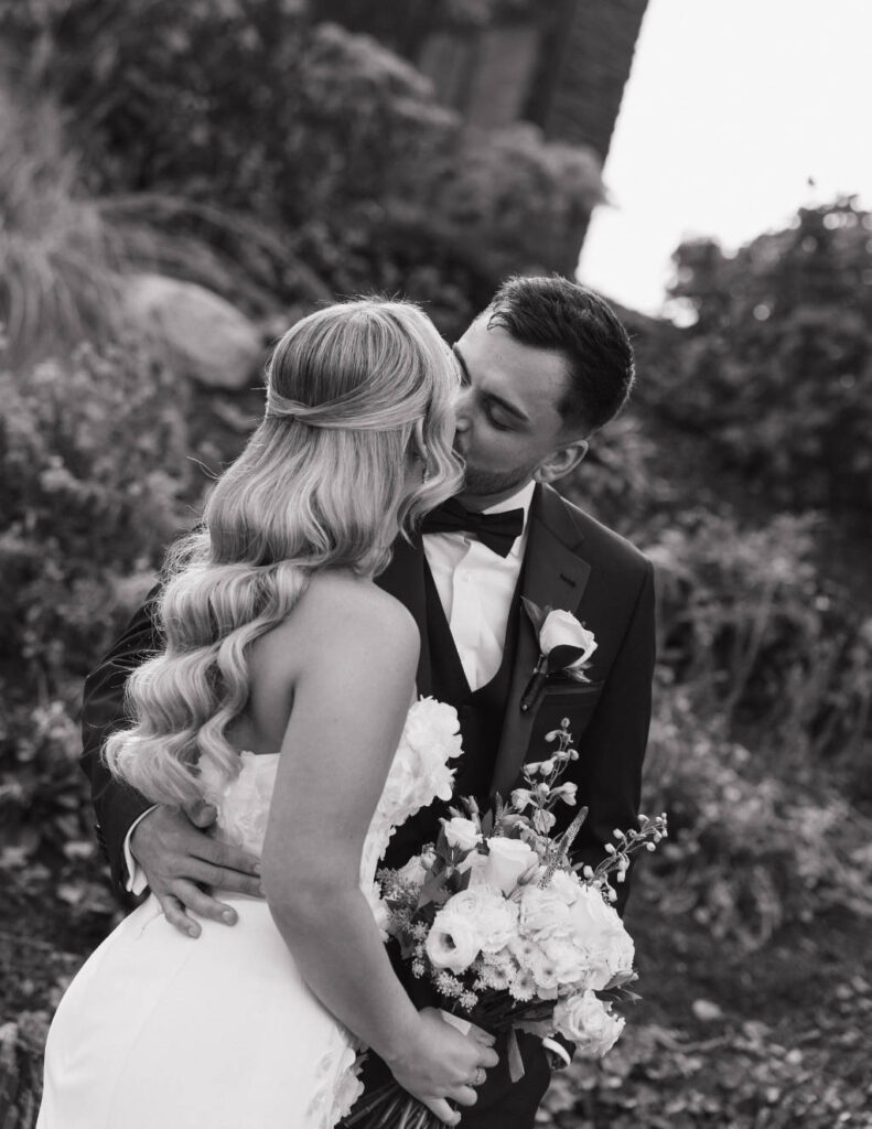 Candid black-and-white wedding moment captured by Stevie J Davis Photography.
