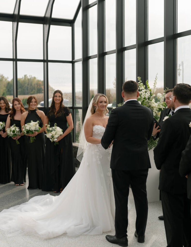 Black-and-white candid wedding moment by Stevie J Davis Photography.