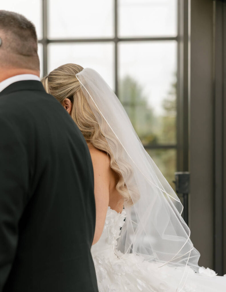 Bride walking down the stairs at a Columbus Ohio wedding, photographed by Stevie J Davis Photography.
