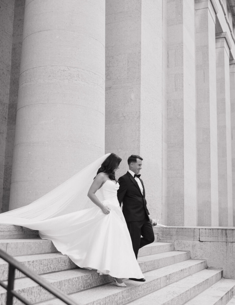 Stevie J Davis Photography capturing the Walkers’ black-tie wedding portraits outside The Ellis.