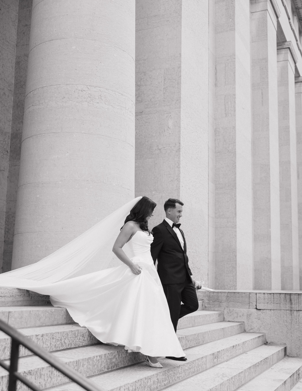 Stevie J Davis Photography capturing the Walkers’ black-tie wedding portraits outside The Ellis.