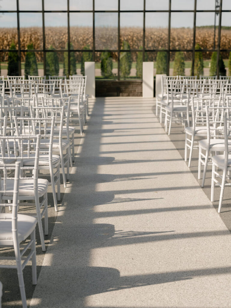 Ceremony aisle view at The Everhart Gathering Place captured by Stevie J Davis Photography.