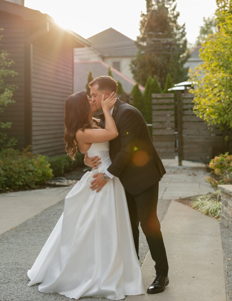 The Walkers sharing a kiss during their downtown Columbus wedding.