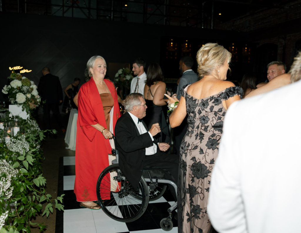 Family members gathering during the wedding reception.